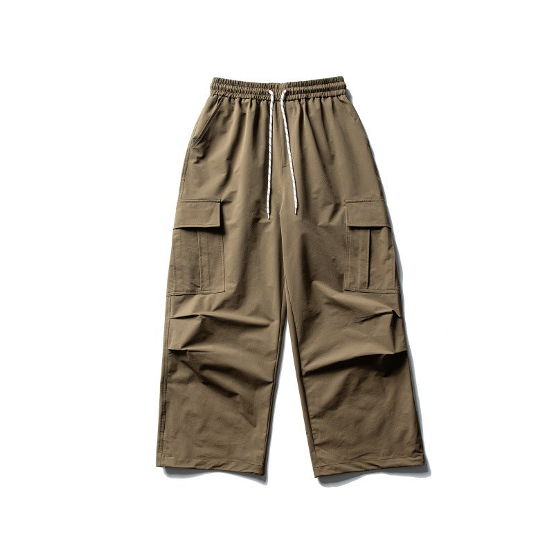 Unisex Wide Cargo Utility Pants in Baggy Cut with Elastic Drawstring and Generous Flap Pockets