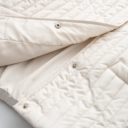 Women's short quilted jacket with vertical quilting, shirt collar and heart button placket EVA-US