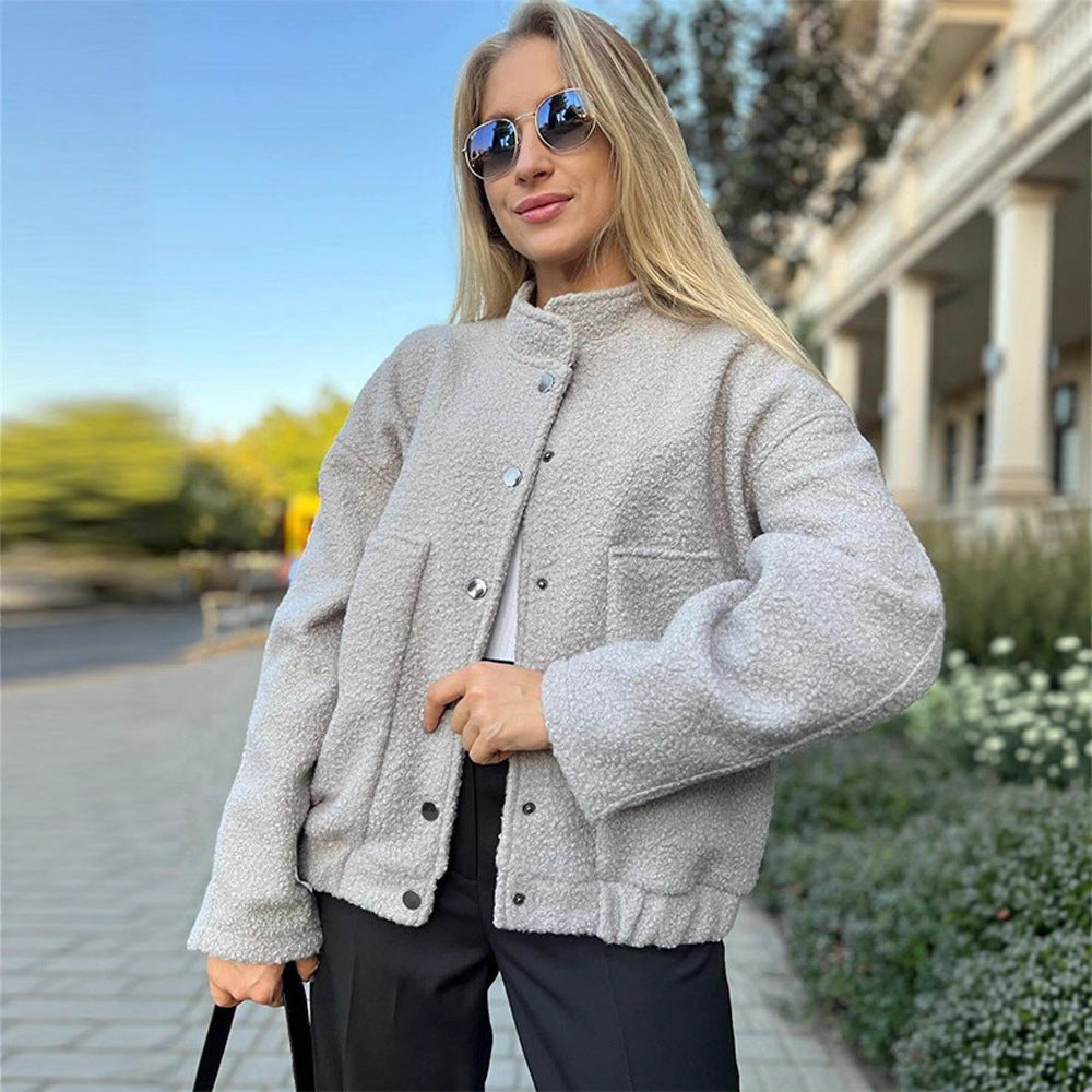 Women's teddy fleece bomber jacket in boxy cut with snap button closure and patch pockets EVA-US
