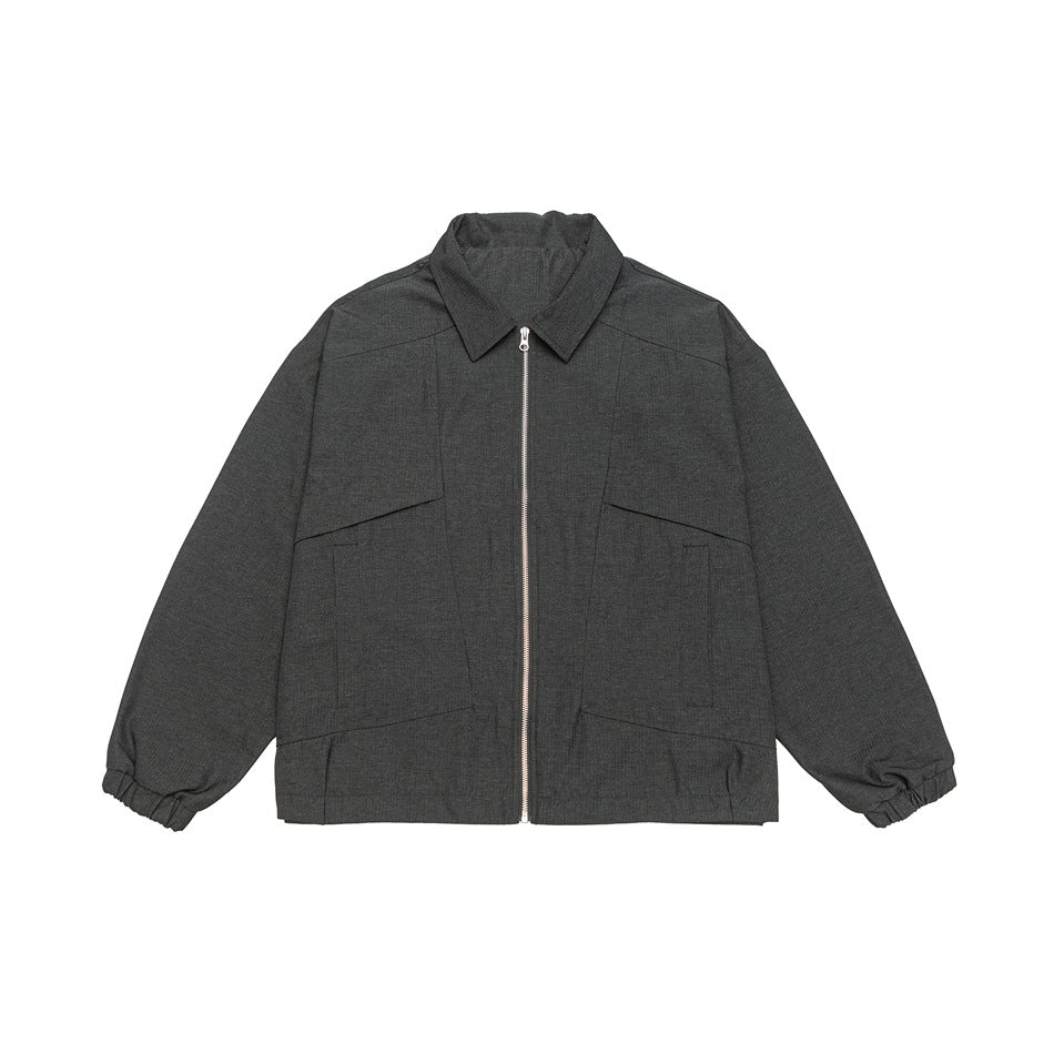 Unisex short jacket in boxy cut with continuous zipper and flap pockets EVA-US
