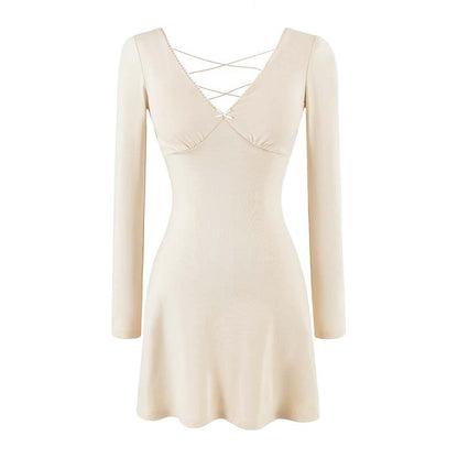 Ladies form-fitting mini dress with a deep V-neckline, gathered bust, and crossed back straps EVA-US