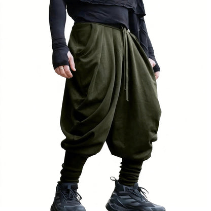 Men's avant-garde harem pants with wrap front, elastic waistband, and narrow lower leg EVA-US