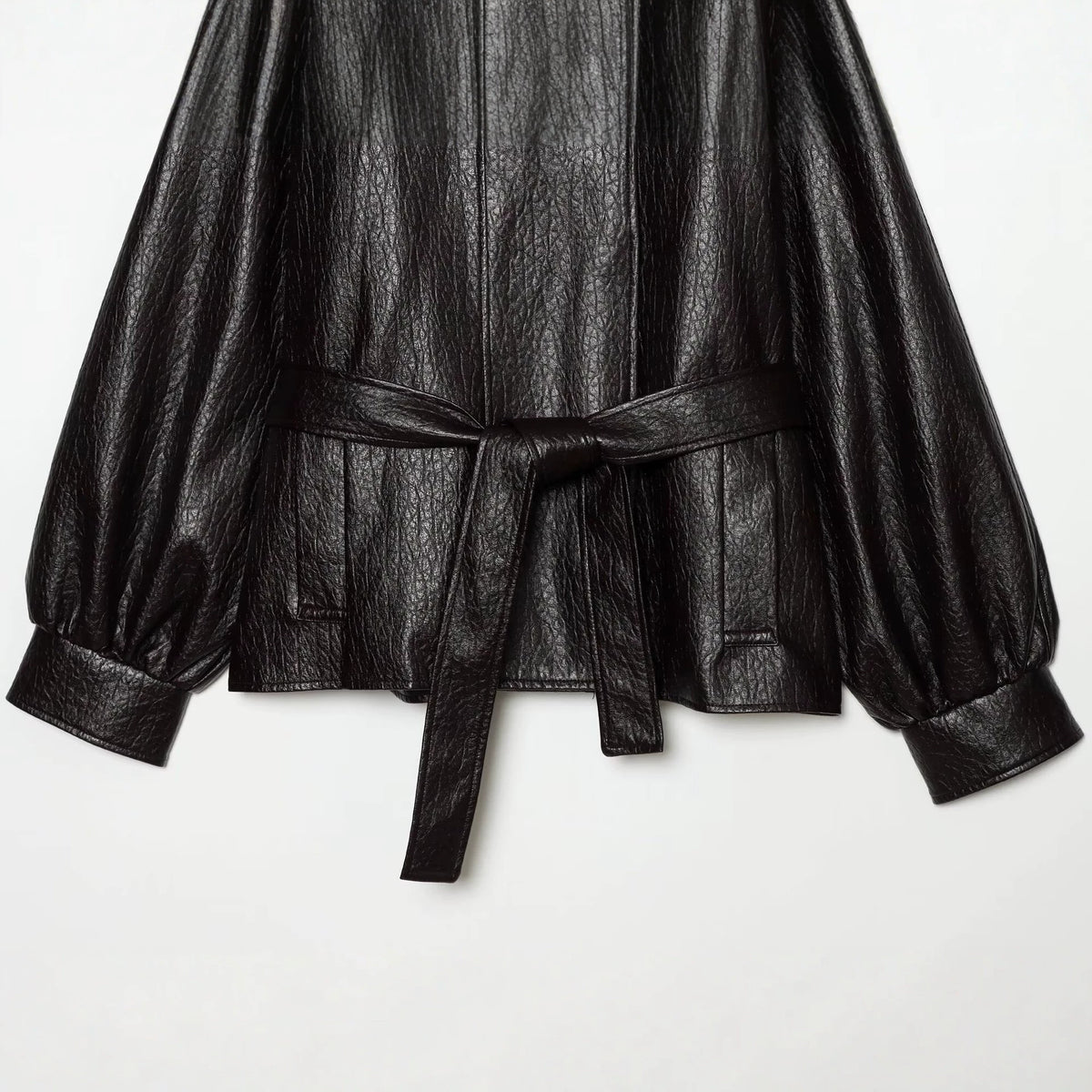 Women's short jacket made of faux leather with high buckle collar and waist belt EVA-US