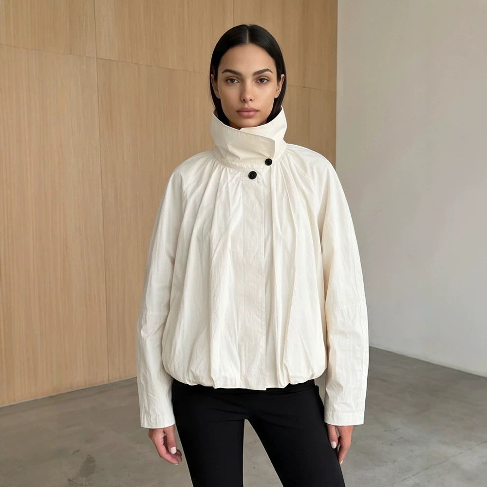 Women's short jacket with high stand-up collar, gathered shoulder area, and elastic hem EVA-US