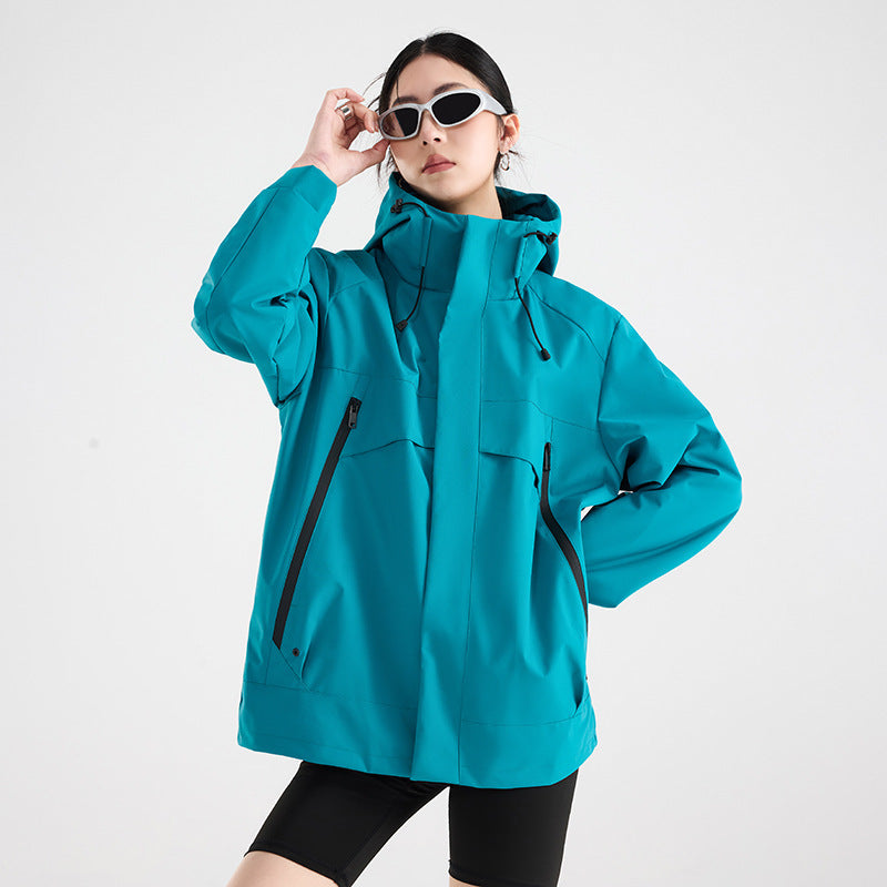 Women's technical waterproof oversized parka with hood and concealed zip pockets EVA-US