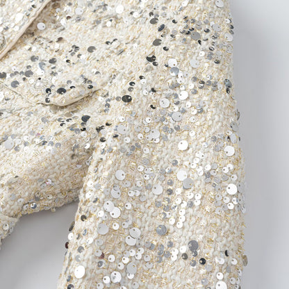 Women's short jacket made of bouclé with sequin trim, decorative pearl buttons, and a belted waist EVA-US