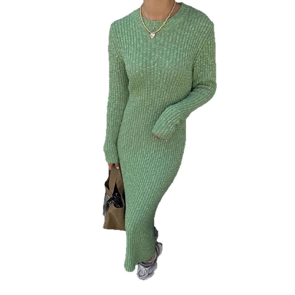 Women's long ribbed knitted dress with matching maxi cardigan, side buttons, and voluminous balloon sleeves