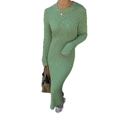 Women's long ribbed knitted dress with matching maxi cardigan, side buttons, and voluminous balloon sleeves