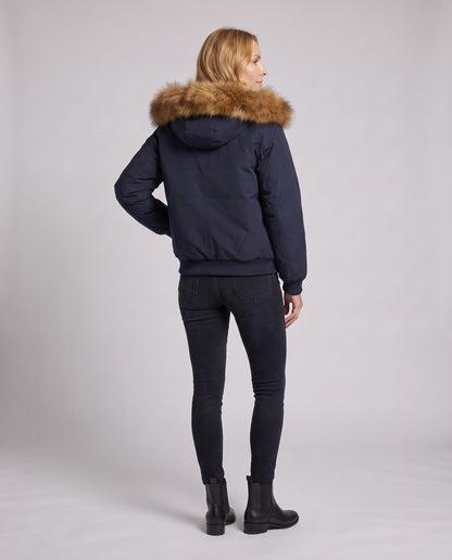 Women's short urban thermal parka with detachable faux fur trim, raglan sleeves, and concealed two-way zipper
