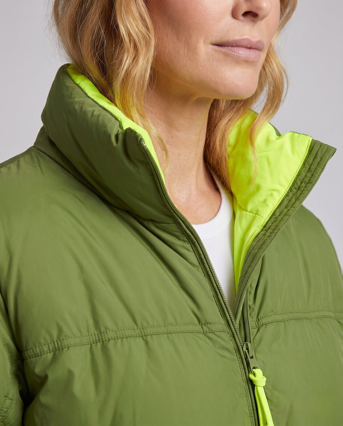 Women's short padded boxy puffer with two-layer stand collar and concealed zipper placket
