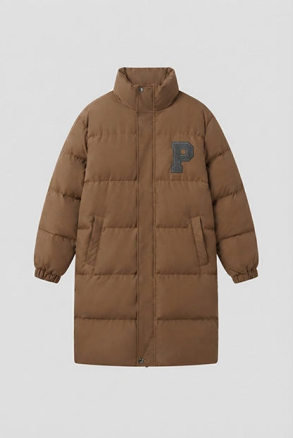 Women's longer boxy thermo puffer with high stand-up collar, college patch, and noise-reducing outer shell