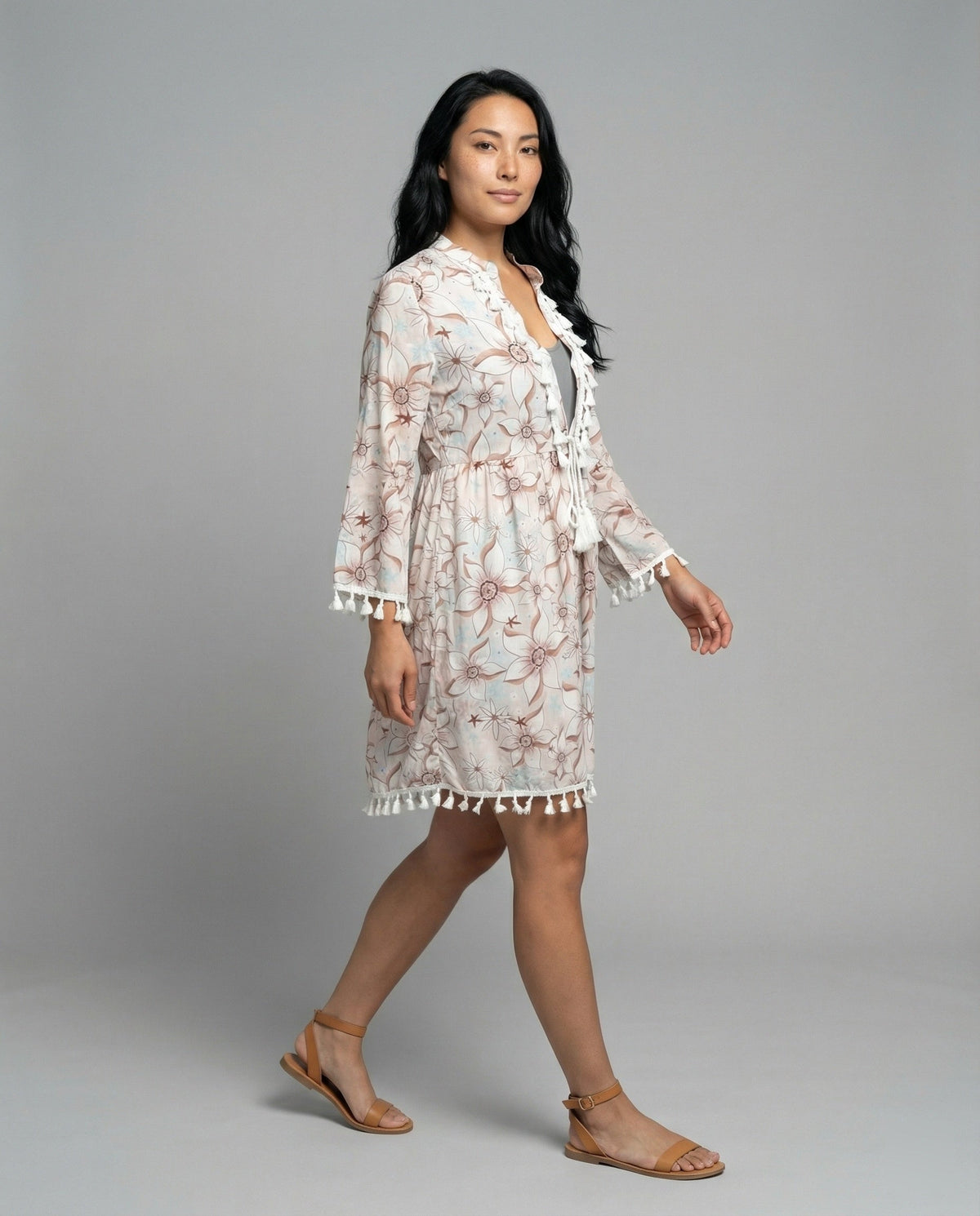 Women’s beach dress with high collar and romantic floral pattern