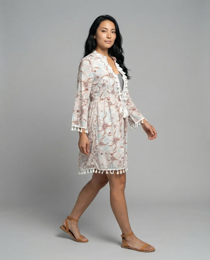 Women’s beach dress with high collar and romantic floral pattern