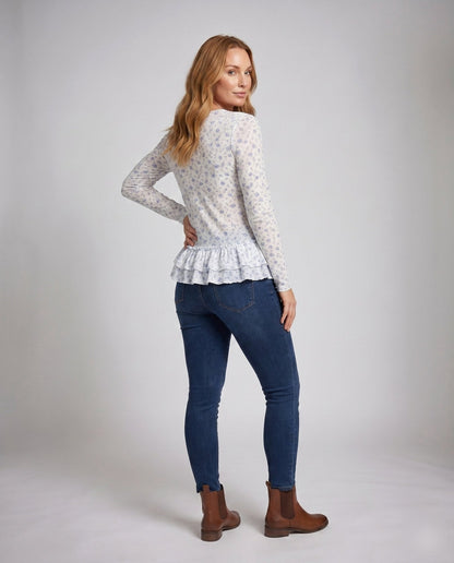 Ladies blouse with fresh floral print and playful ruffled hem - Chichicherry