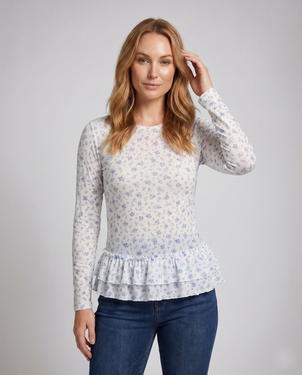 Ladies blouse with fresh floral print and playful ruffled hem - Chichicherry