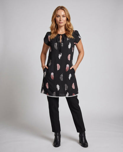 Ladies summer dress with playful feather design - Chichicherry