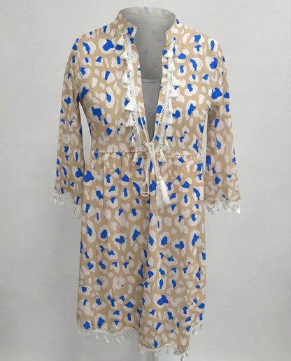 Women’s beach dress with high collar and romantic floral pattern