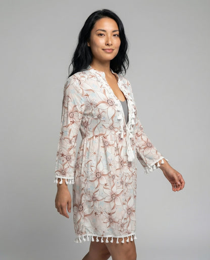 Women’s beach dress with high collar and romantic floral pattern