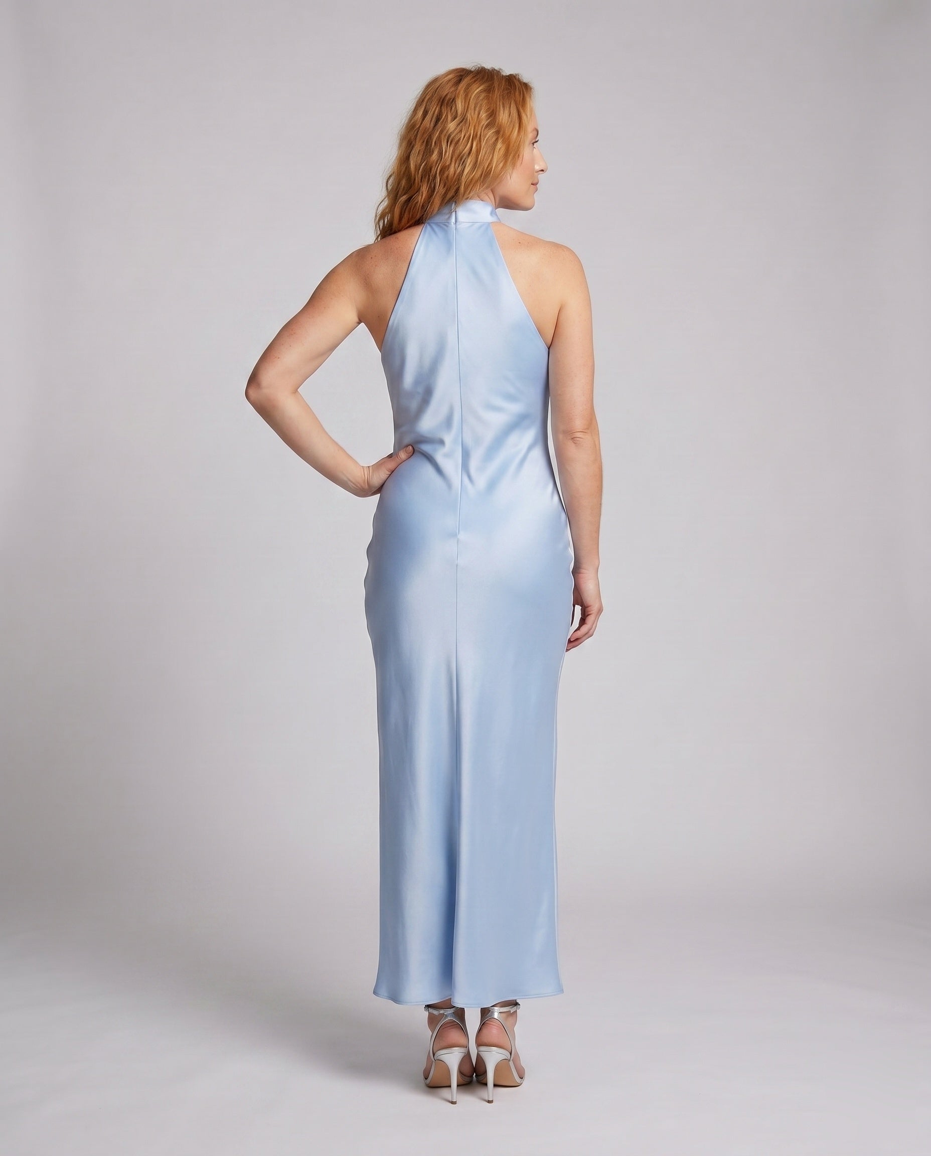 Women Elegant Maxi Dress with Shimmering Halter Design - back view