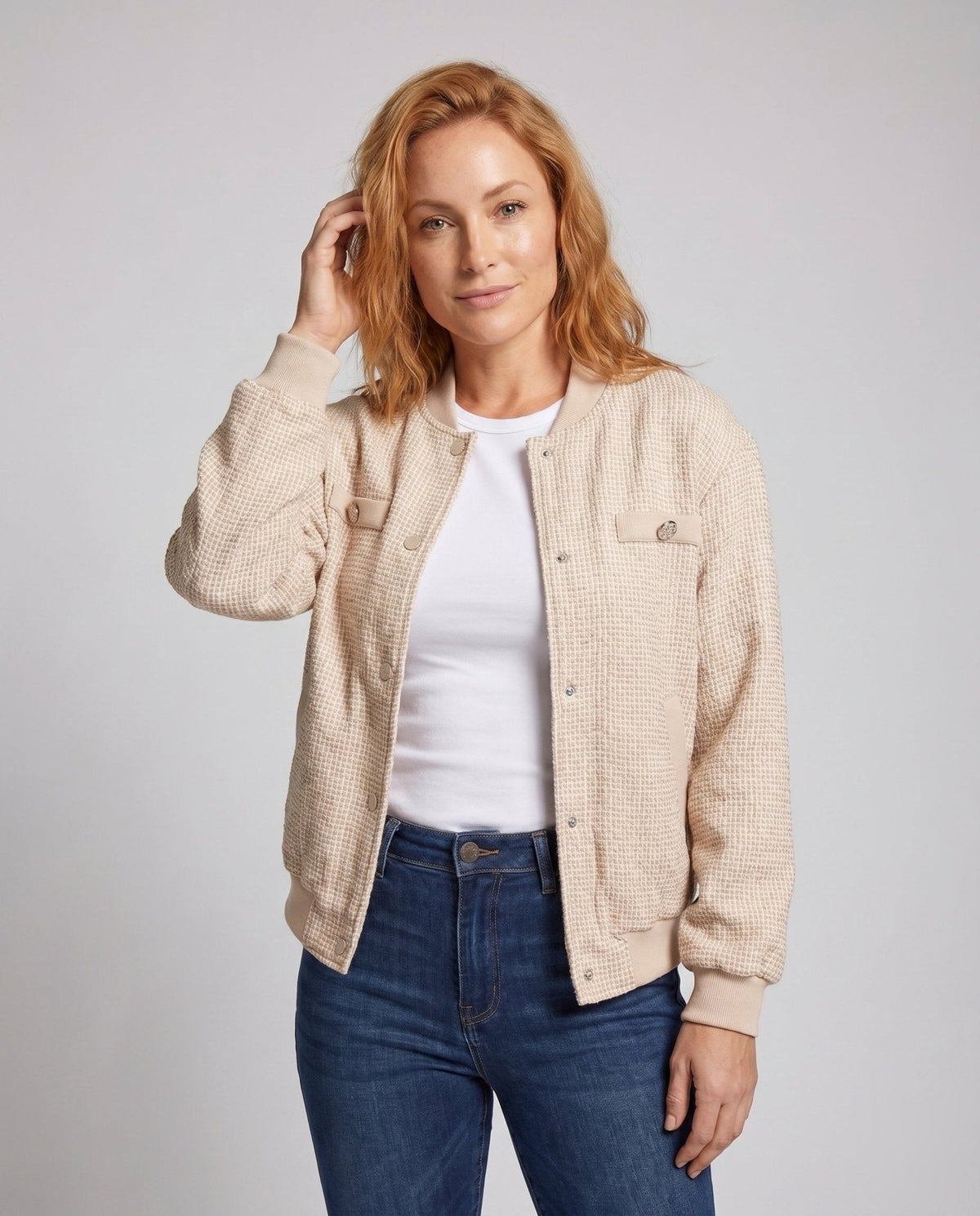 Women's fashionable bomber jacket with textured fabric and practical pockets - Chichicherry