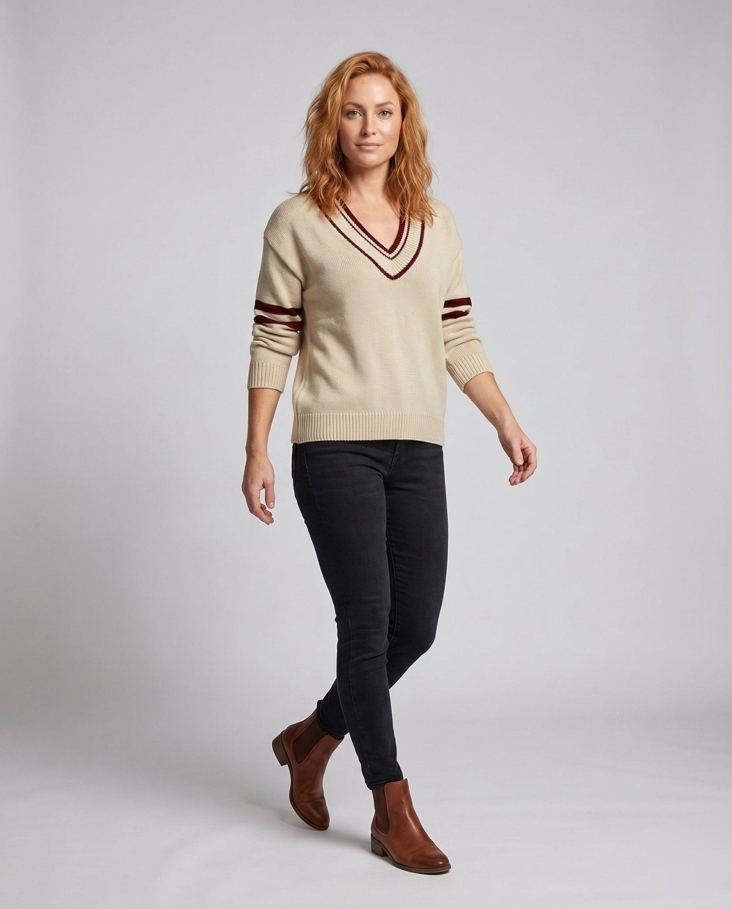 Women's knit sweater with deep V-neck and sporty stripes - Chichicherry