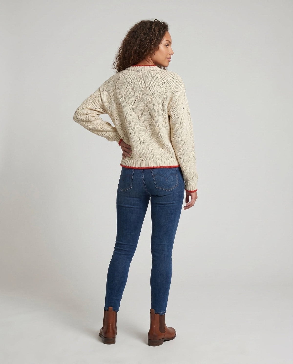 Women's knit sweater with fish motif and colorful hem - Chichicherry