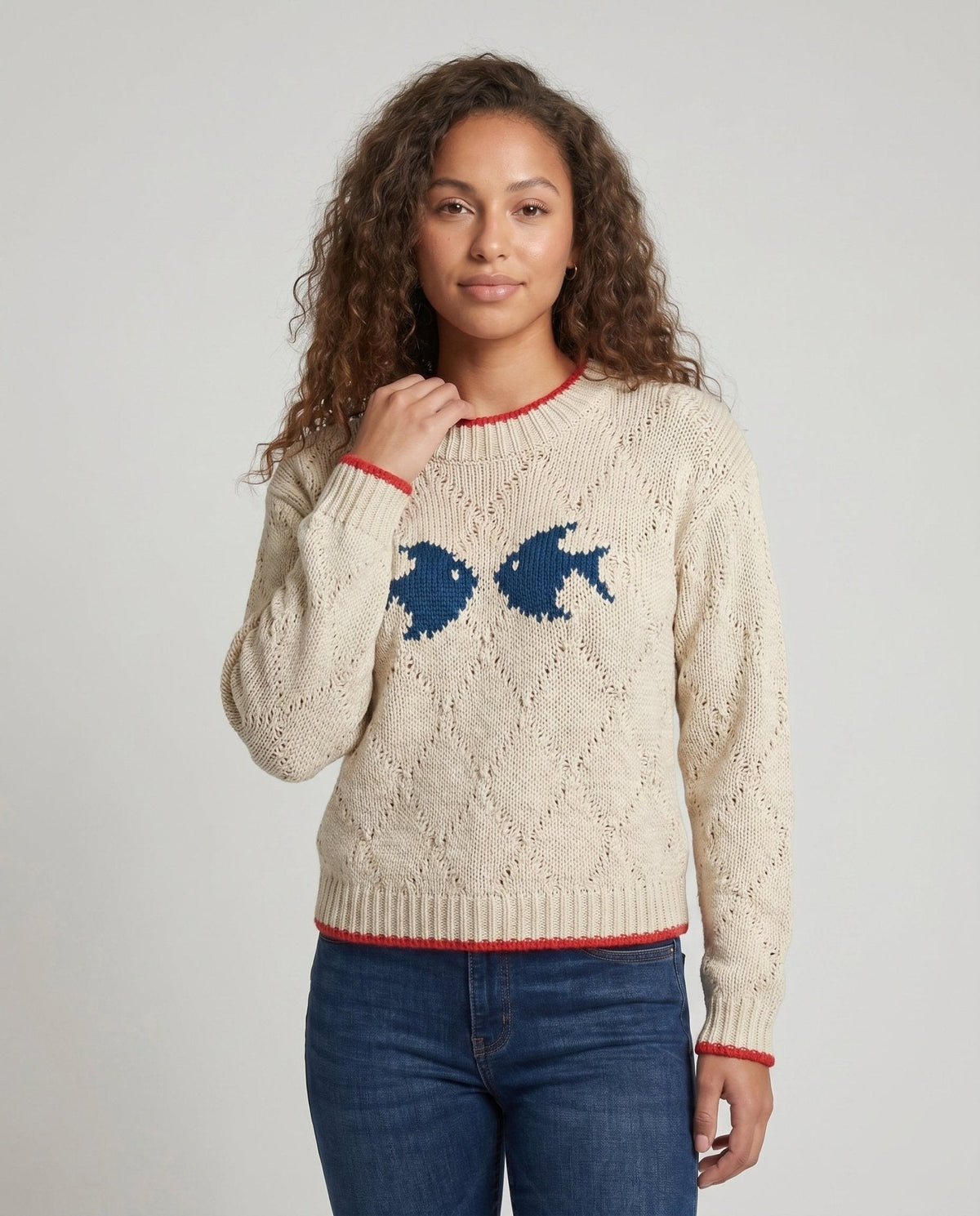 Women's knit sweater with fish motif and colorful hem - Chichicherry