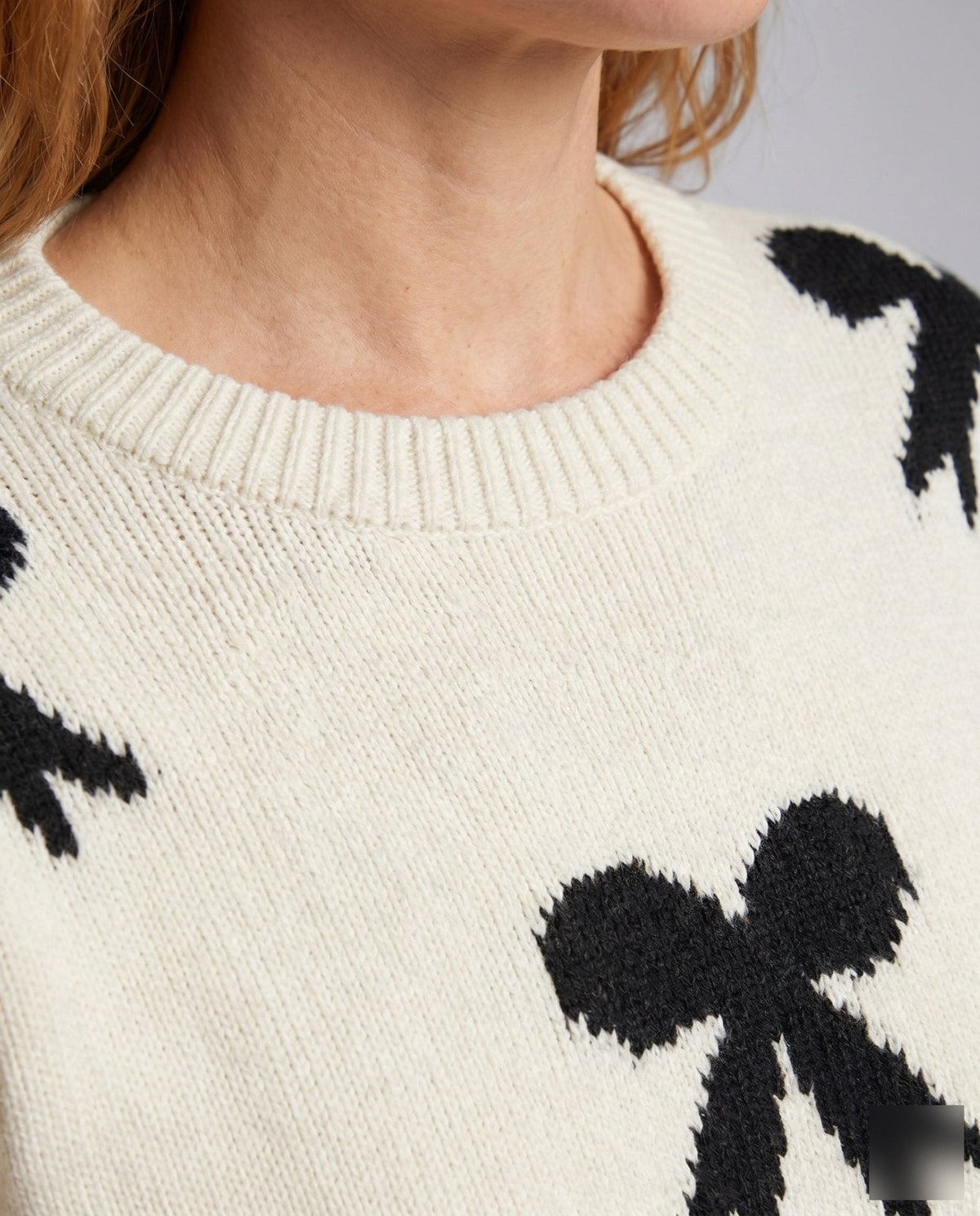 Women's knit sweater with playful bow motif and casual fit - Chichicherry