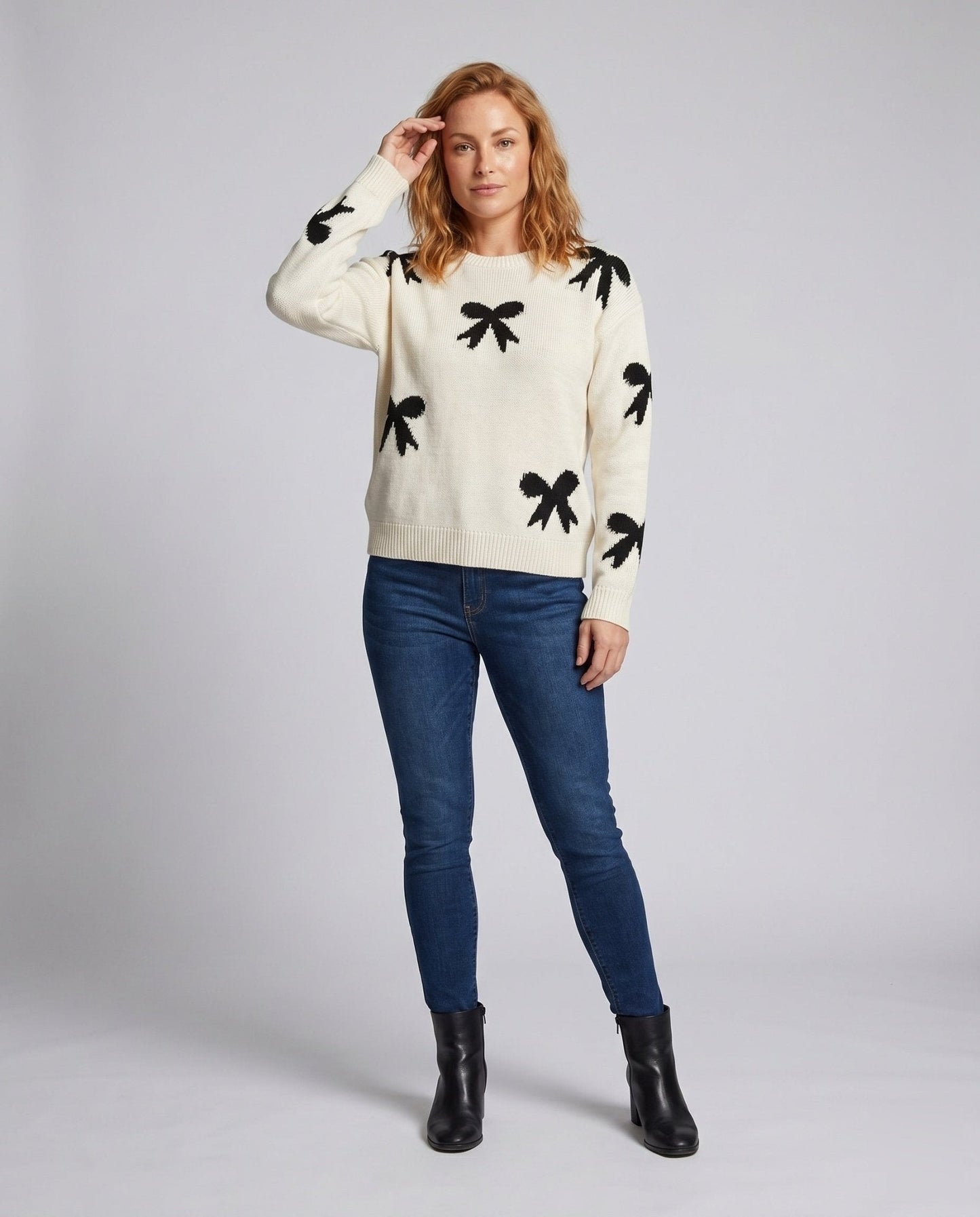 Women's knit sweater with playful bow motif and casual fit - Chichicherry