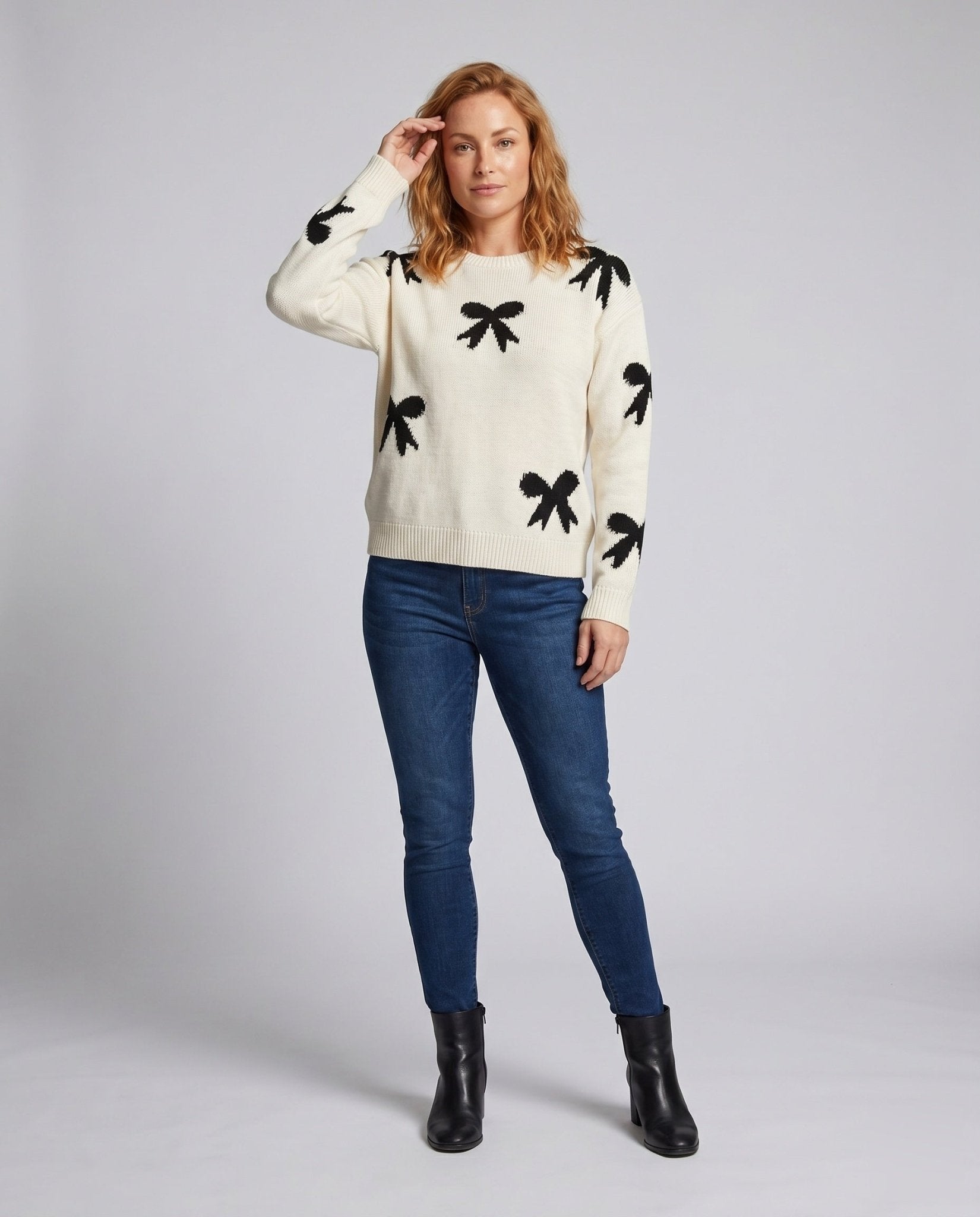 Women's knit sweater with playful bow motif and casual fit - Chichicherry