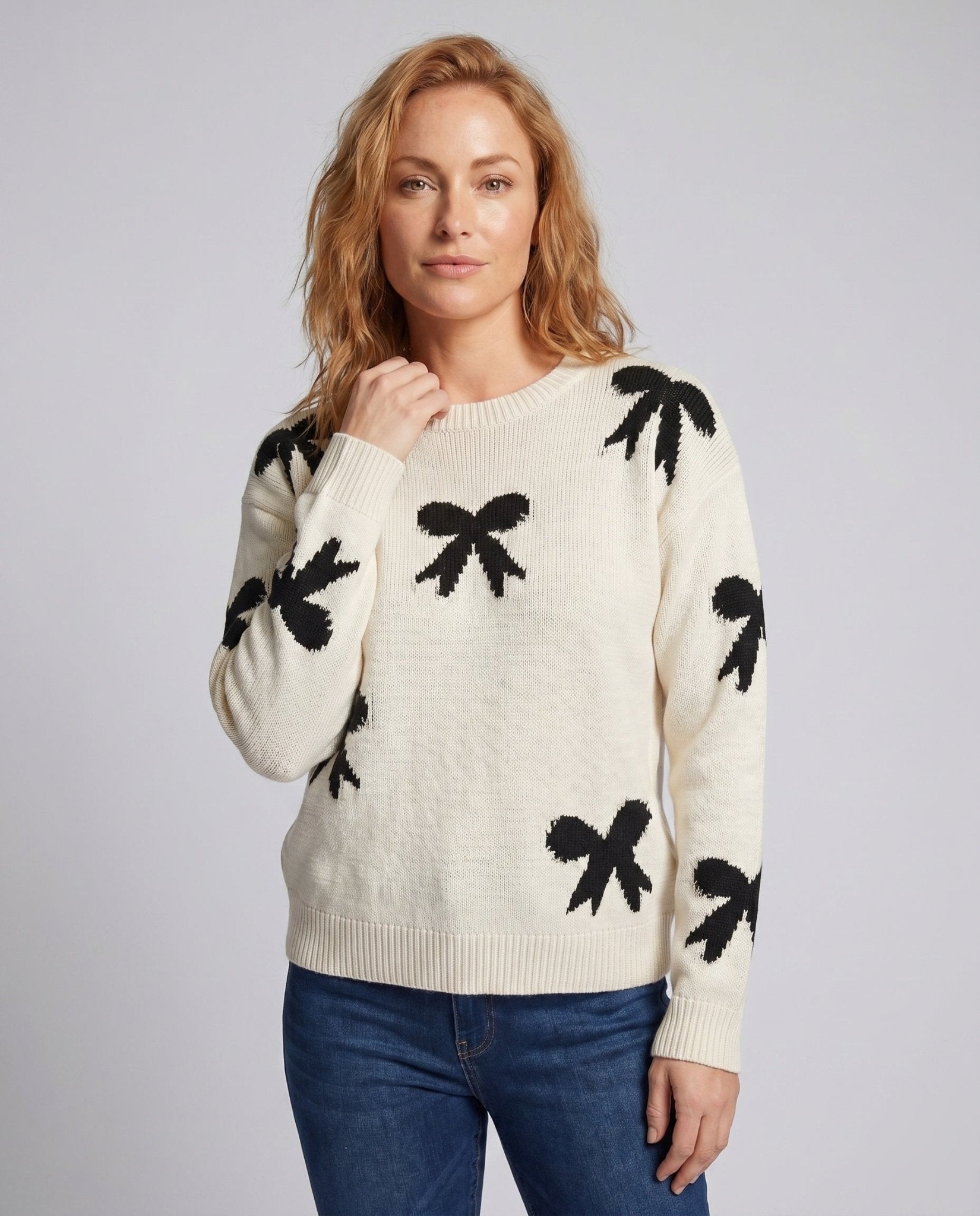 Women's knit sweater with playful bow motif and casual fit - Chichicherry
