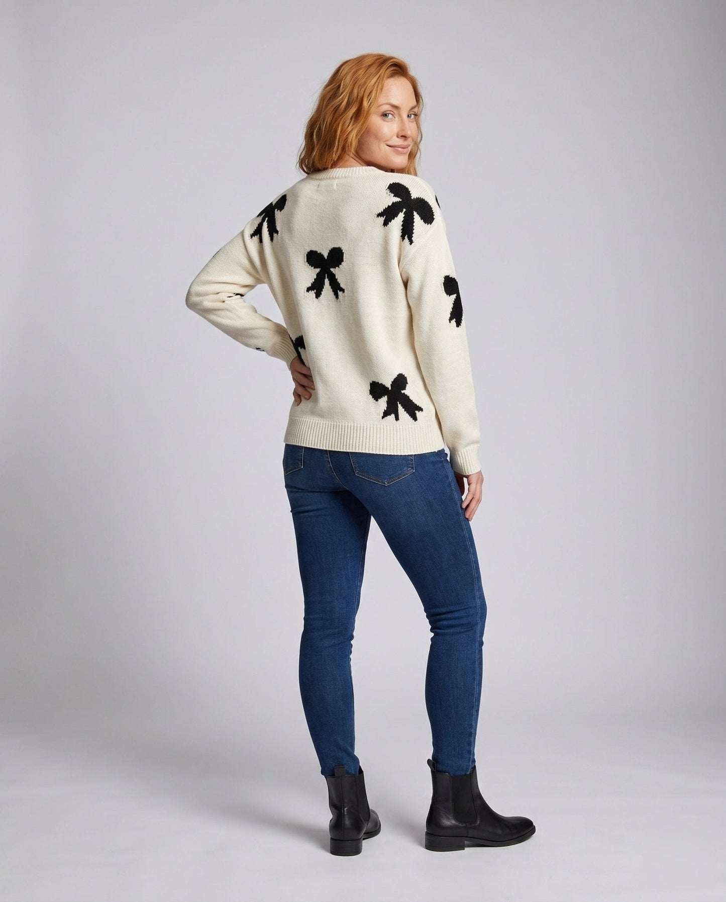 Women's knit sweater with playful bow motif and casual fit - Chichicherry
