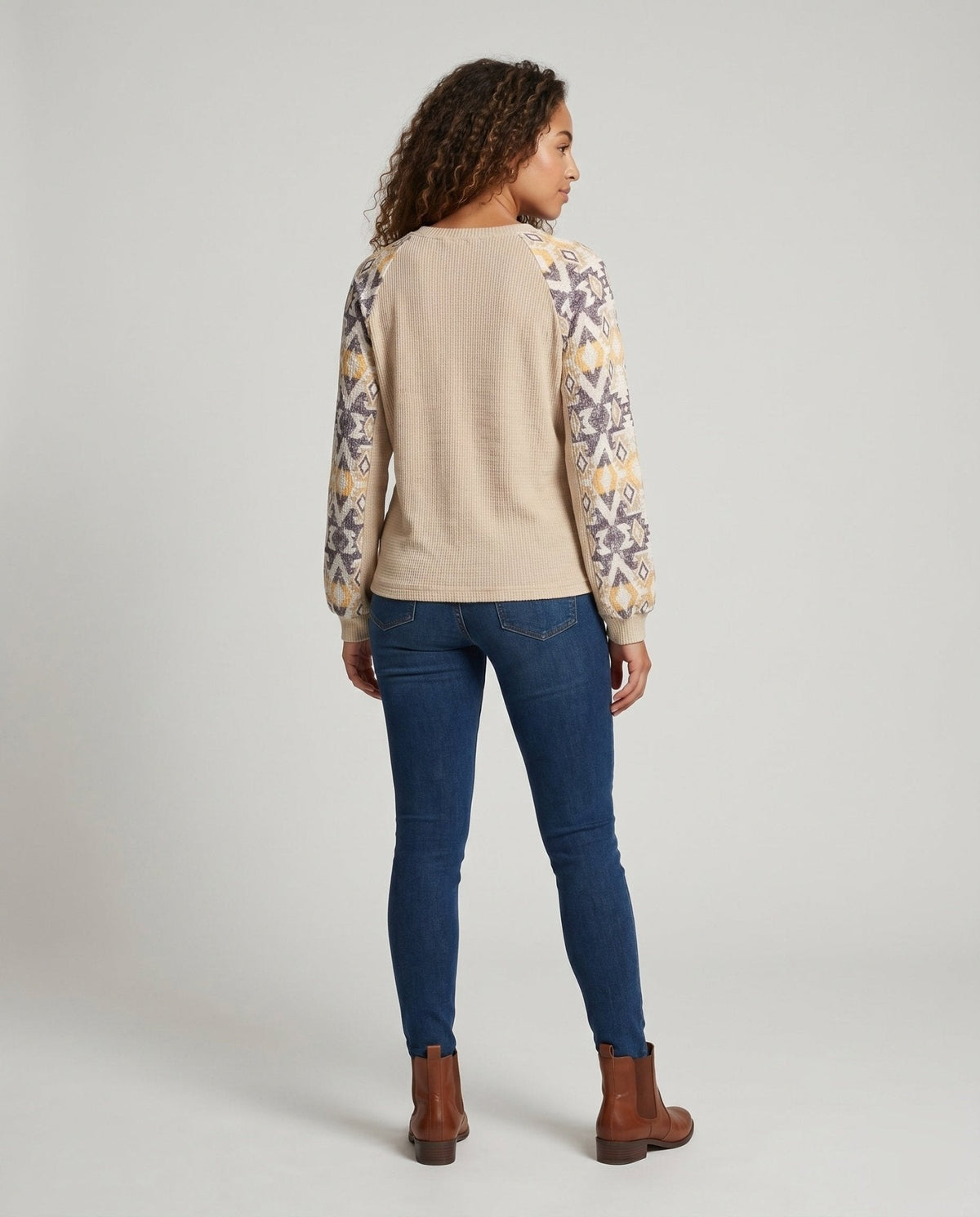 Women's knit top with colorful sleeve details - Chichicherry