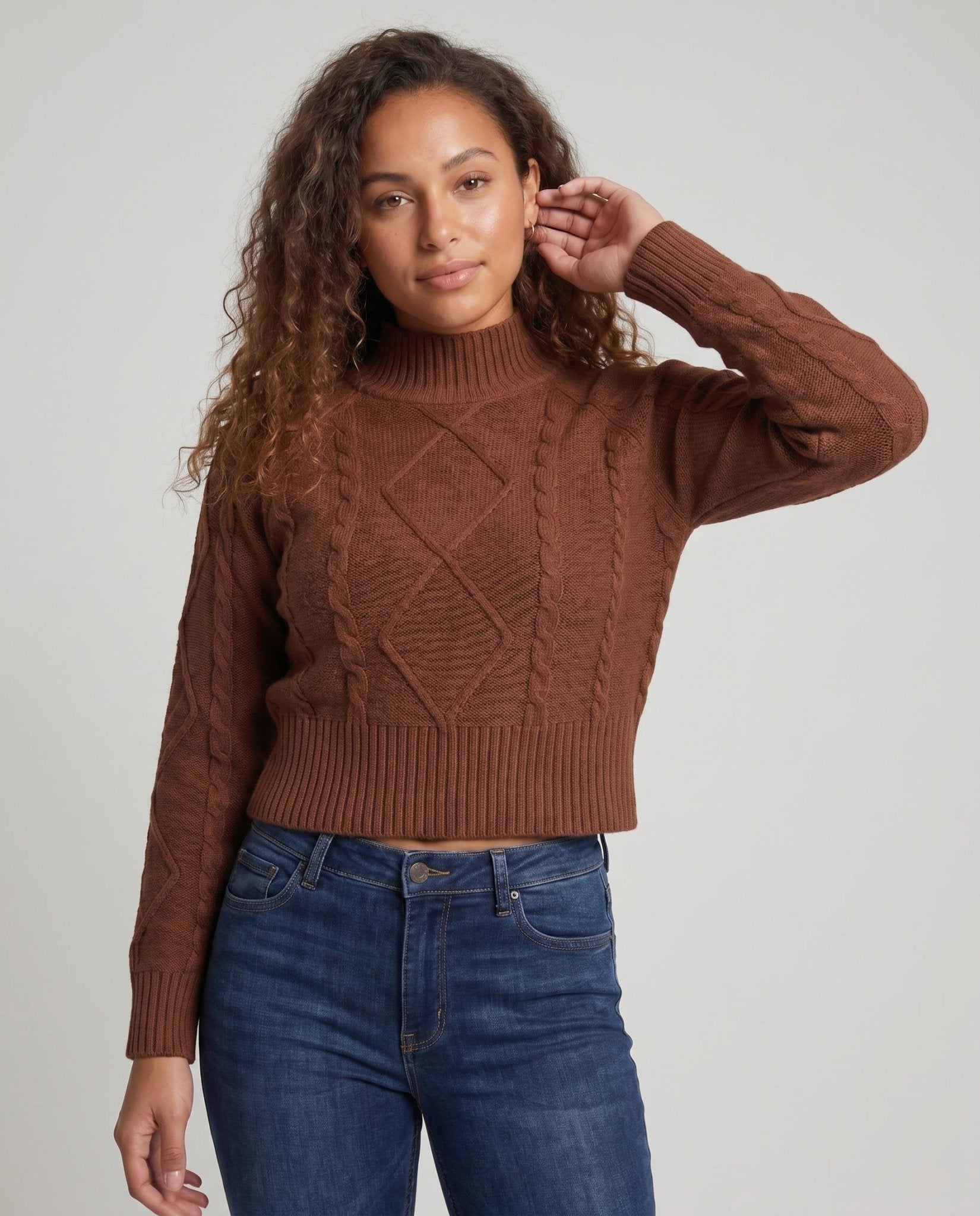 Women's knitted pullover with a stylish cable pattern and cropped cut - Chichicherry