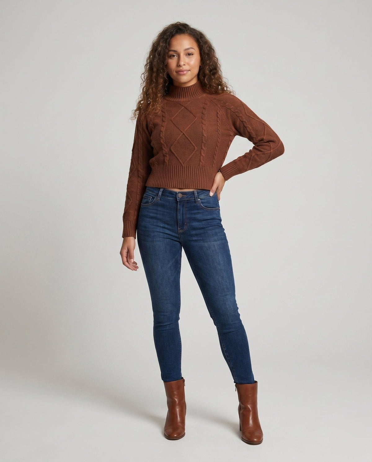 Women's knitted pullover with a stylish cable pattern and cropped cut - Chichicherry