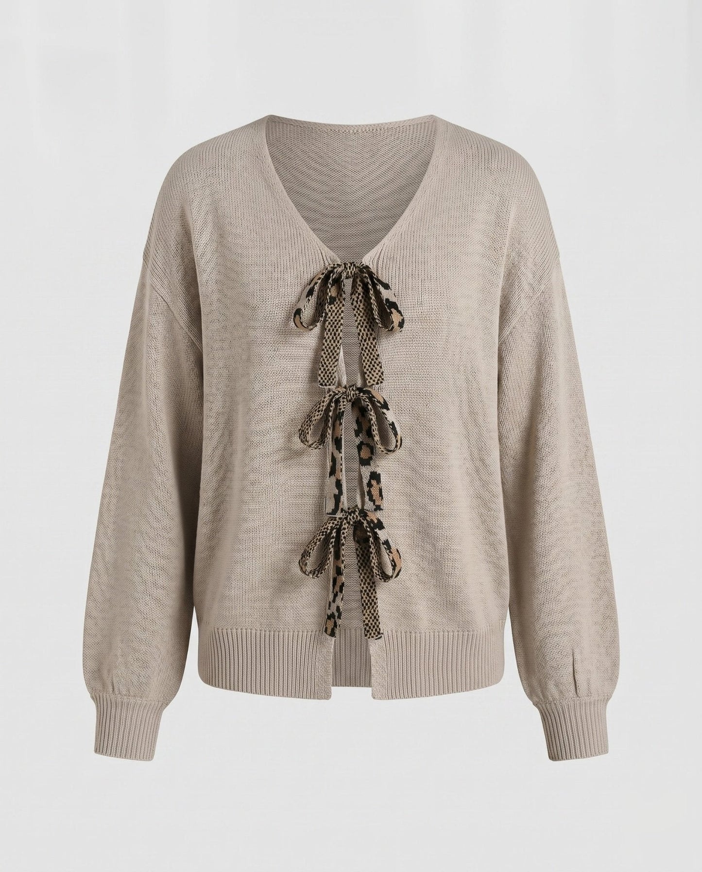 Women's knitted sweater with fashionable V-neck and bow elements - Chichicherry