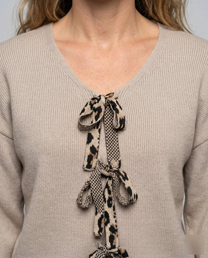 Women's knitted sweater with fashionable V-neck and bow elements - Chichicherry
