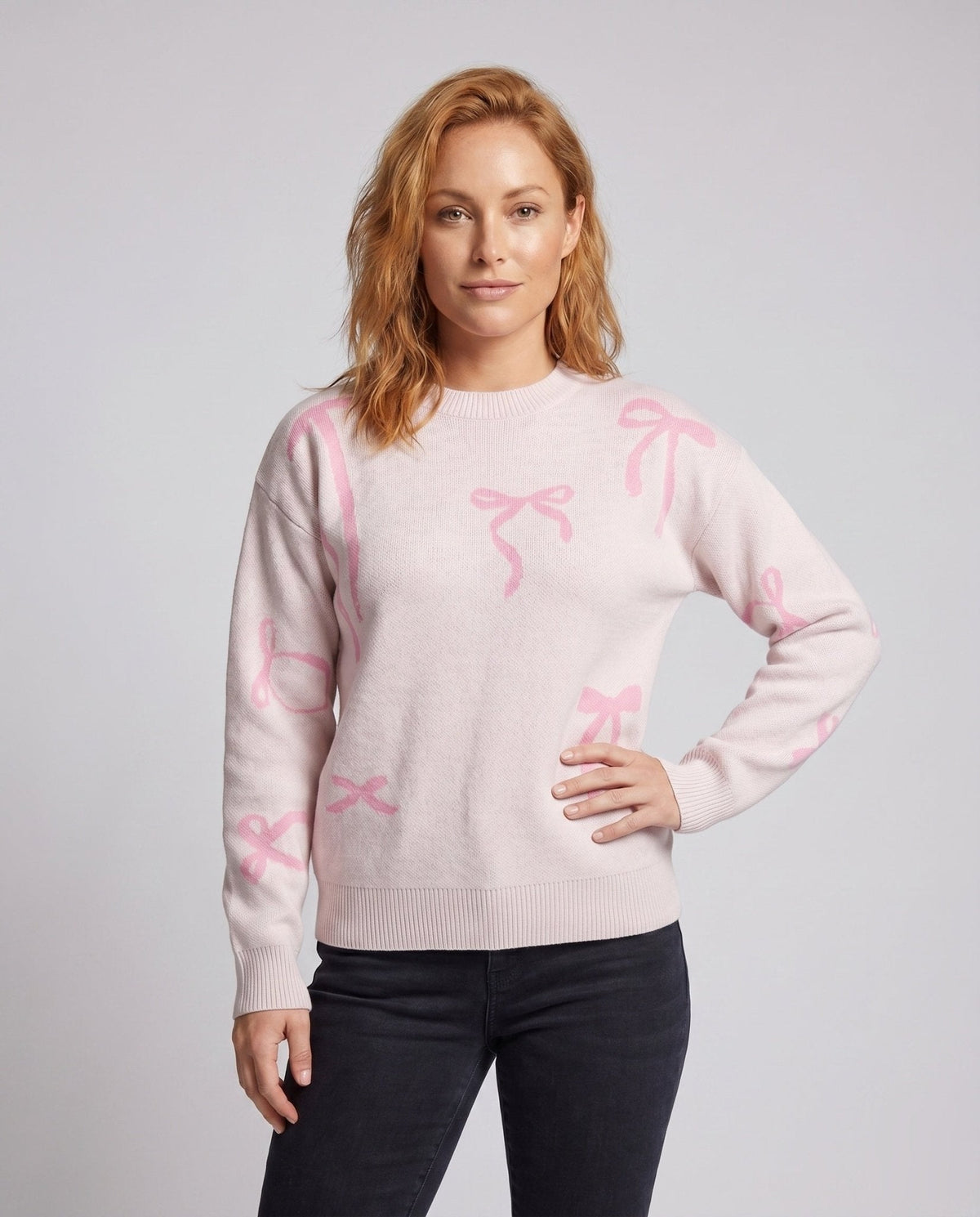 Women's knitted sweater with playful bow motifs - Chichicherry