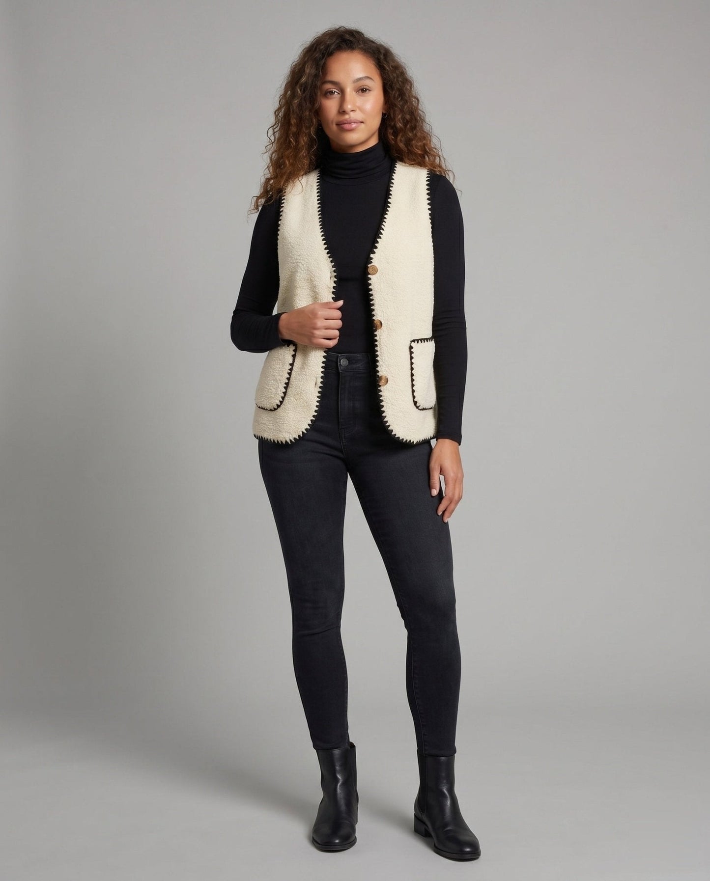 Women's knitted vest with contrasting seams and practical pockets - Chichicherry