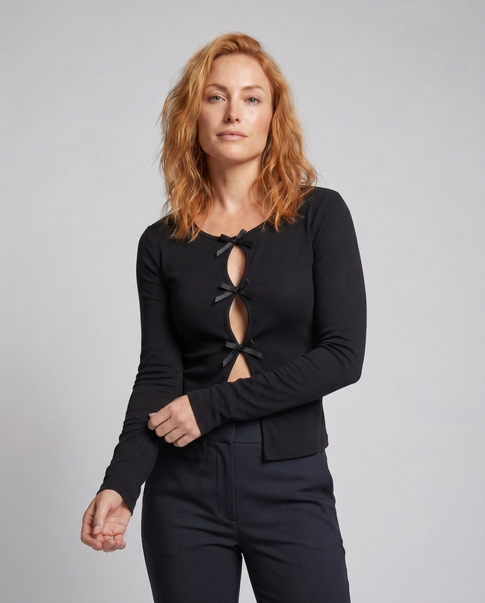 Women's long sleeve blouse with decorative bows and sophisticated button placket - Chichicherry