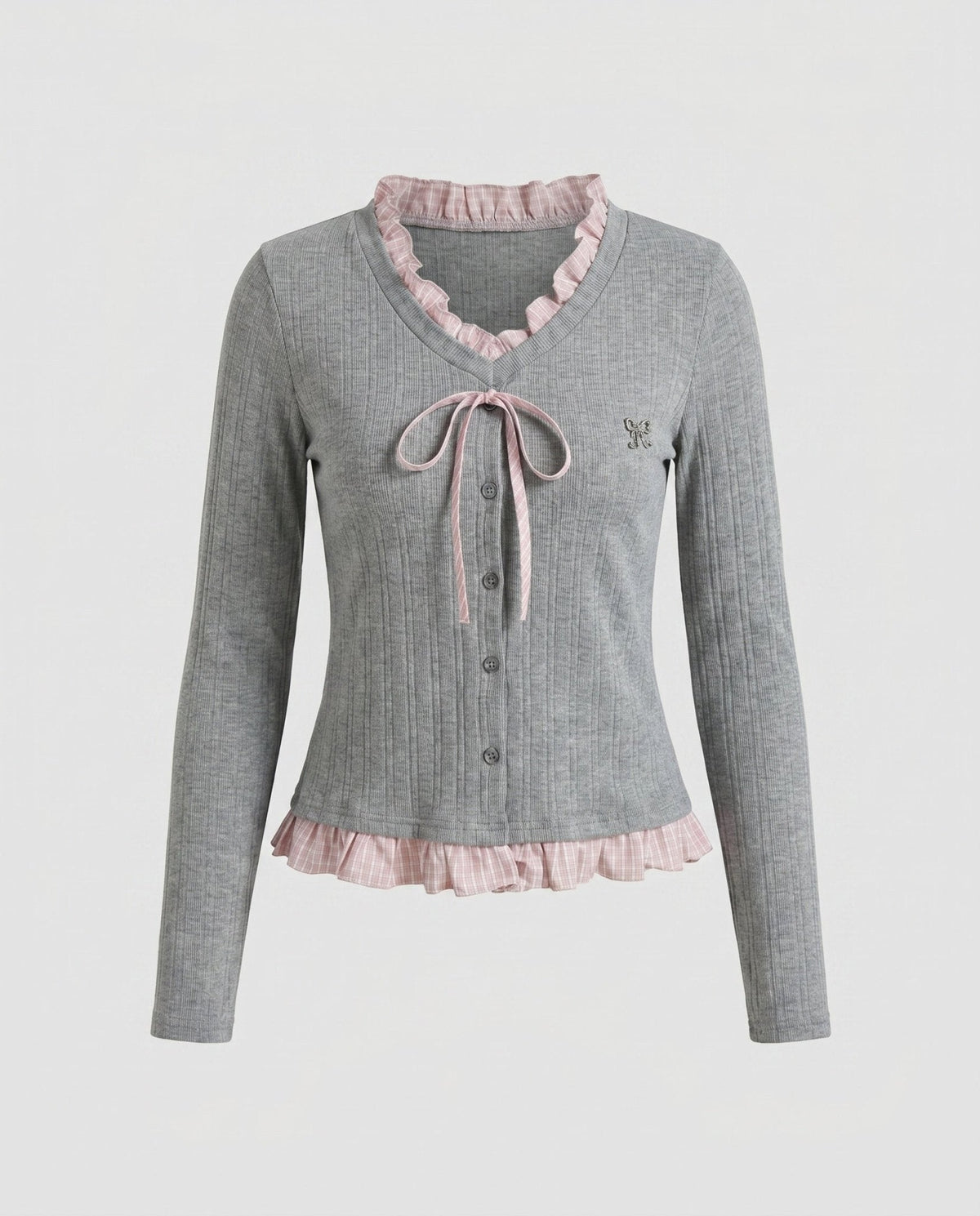 Women's long sleeve blouse with playful ruffled hem and decorative loop design - Chichicherry