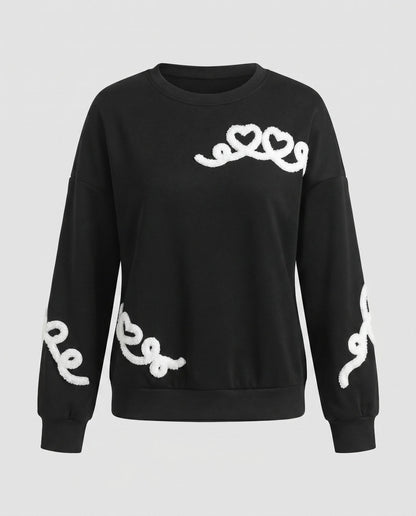 Women’s sweatshirt with playful heart design and casual fit - Chichicherry